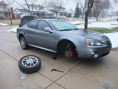 bent tire rim, pontiac, tire change