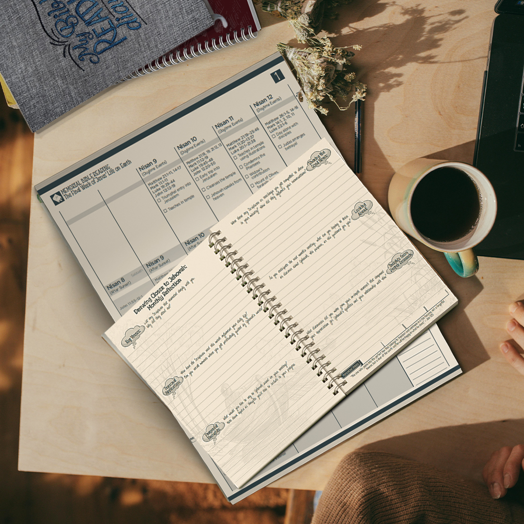 Bible reading diary sitting open on a desk