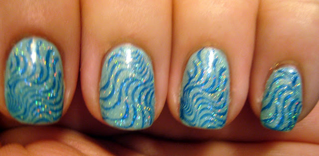 Holographic Blue Water Nails” title=