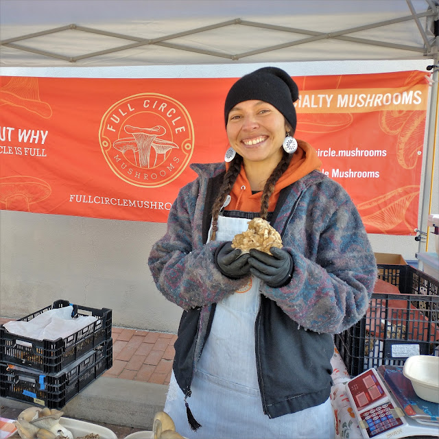 Mushrooms and brilliant smile at Las Cruces Farmers and Crafts Market. December 2022. Credit: Mzuriana.
