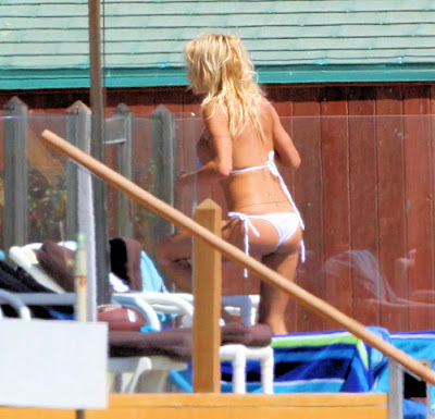 Pamela Anderson At Malibu Beach Tanning