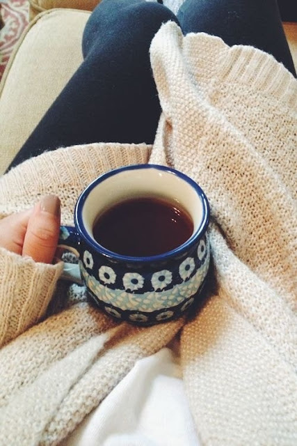 tea cup in lap