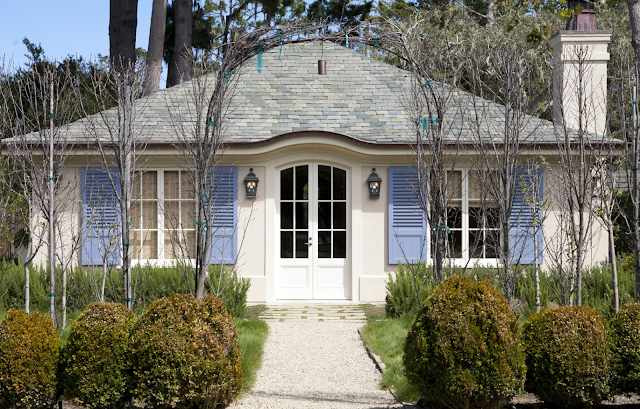 Gorgeous French Country chartreuse style home with French blue shutters by John Malick - found on Hello Lovely Studio