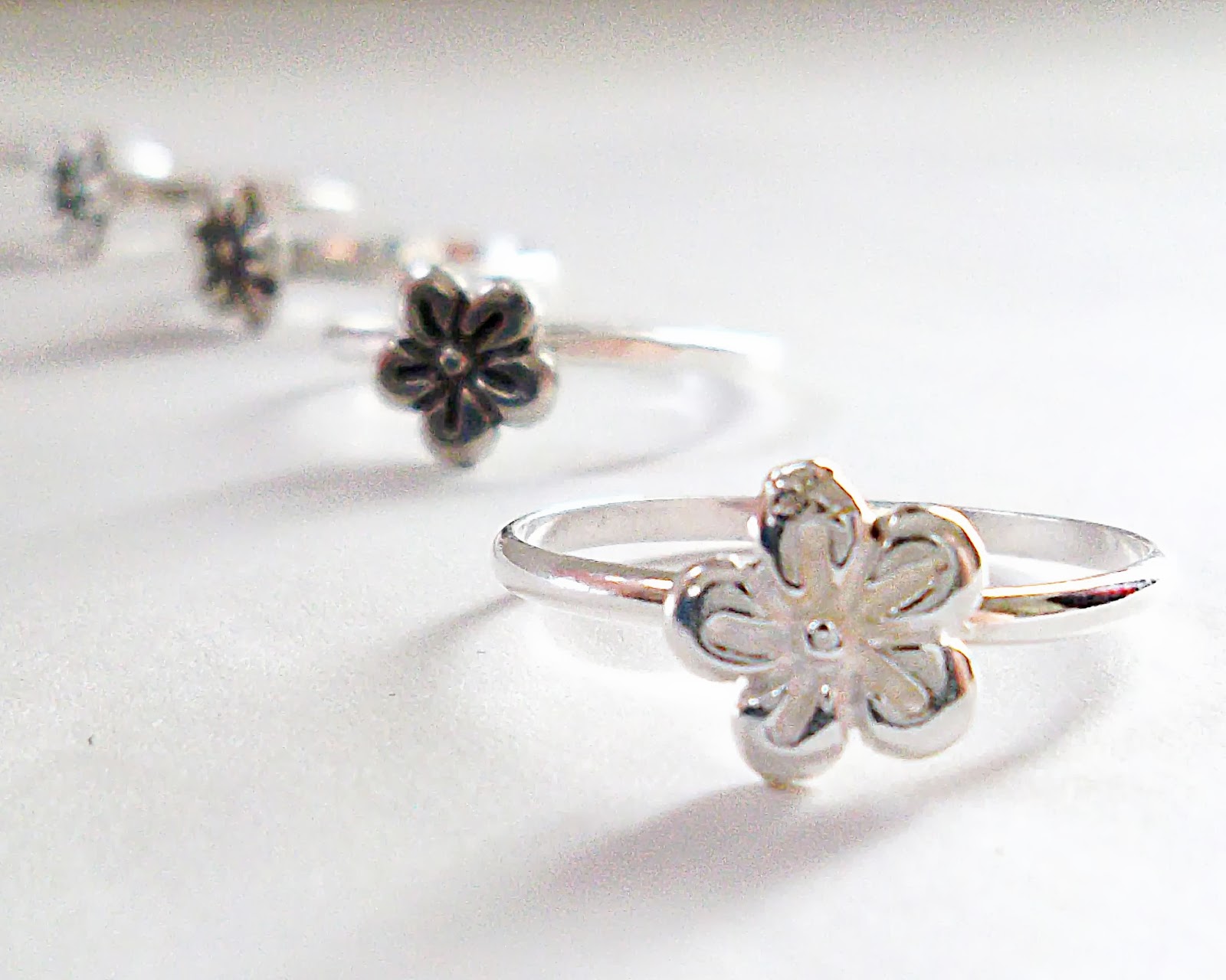 https://www.etsy.com/listing/178174024/sterling-silver-flower-ring-made-to
