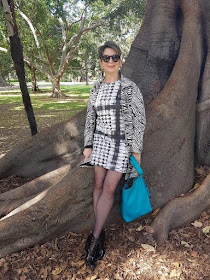 Black&white-shift-dress-animal-print-coat-turquoise-handbag