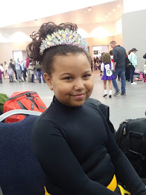 Irish dancer showing off her tiara at Mid America Oireachtas in Louisville, Kentucky