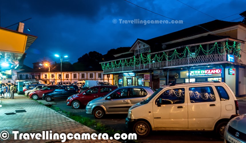 While in Goa, it's highly recommended to spend some part of the stay around Panjim City. Being in Panjim is a very different experience. There are some very interesting restaurants, pubs and shopping options with a very different enviornment all around. This Photo Journey shares some pictures from Panjim Town, along with some important details...When we went for cruise on Mandovi River, we planned to have a round of Panjim city and have dinner there. We parked our car near the church across the river and started walking around the roads of Panjim town. After some shopping, we thought of finding a good place to dinner. It was not easy to decide because every other restaurant was unique and looked awesome. The very first criteria was to find a good place for sea-food, so all fancy restaurants offering Pizzas, baked stuff etc were out. There were some interesting bakeries as well, but we stopped ourselves to change the plan. After some time, we thought to call our car-owner from whom we had hired a Maruti WagonR for 4 days. We had only asked for the recommended restaurant but he suggested few interesting stores as well. Now first thing was solved for us, so we moved towards the recommended restaurant 'The Upper House', which was no doubt a great place to have food in Panjim. During the stay we visited three popular restaurants, but loved 'The Upper House' the most !Panajim name tells - 'land that never floods'. It's a very interesting city with concrete buildings in different colors having red-tiled roofs, churches and a riverside promenade. Most of the parts of Panjim are green and well maintained. We visited the town many times during our stay in Goa and every time, it had some surprises for us. We loved being there and keep walking in the streets and markets of Panjim and especially the markets near casino lane around Mandovi River.  Panajim is capital city of Goa, which is one of the top tourist destinations in India. Panjim lies on the banks of the Mandovi River which is popular for it's cruise rides of different kinds. Panjim’s architecture clearly tells that it's quite different from other parts of the country. Goa has very different experiences and it's architecture tells unique story about the place. In the small old quarters of Fontainhas and Sao Tomé, winding alleyways are lined with Portuguese-style houses, boasting distinctive red-tiled roofs, wooden window shutters and rickety balconies decorated with bright pots of petunias. Here, whitewashed churches lurk down laneways, a short wander from technicolour Hindu temples.Casino Royale, in Panjim around Madovi River, is the largest floating Casino in Goa. Casino Royale is considered as one of the most classiest casinos of Goa. On Casino Royale there is a gaming floor which is dedicated to most of the table games & slots. There is a poker room exclusively for the casino game. Visiting Casino Royale is itself an experience. There is a dining area in Casino Royale & China Garden manage the food here. During monsoons, it was not very happening, but it seems that during main tourist season live performances happens to entertain customers on Casino Royale.While visiting Panjim, we also check Tripadvisor to make wise decisions but it turned out confusing. Tripadvisor showered 72 options in Panjim and many of them were not even in Panjim Town. It was good that we had visited many of those places during last two days, so we were well equipped to take a good call of not considering it's suggestions - HEREWalking around these colorful streets of Panjim town is a very different experience and we recommend to spend some time around the town, especially in evening and then choose one of the popular restaurants or pubs to have a great evening.After few more rounds around the streets of Pajim town, we planned to move back to Candolim. The last things to do was liquor wine and we got some really cool Feni bottles from the market.