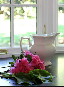 centerpiece with azaleas, hosta and ironstone