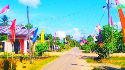 Umbul-umbul Terlihat di  Sepanjang Jalan Desa Siabu, Antusias Masyarakat  Sambut Kepulangan Sang Juara Dunia Leani