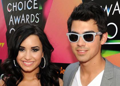 Teaming up on the orange carpet Joe Jonas and Demi Lovato were sidebyside