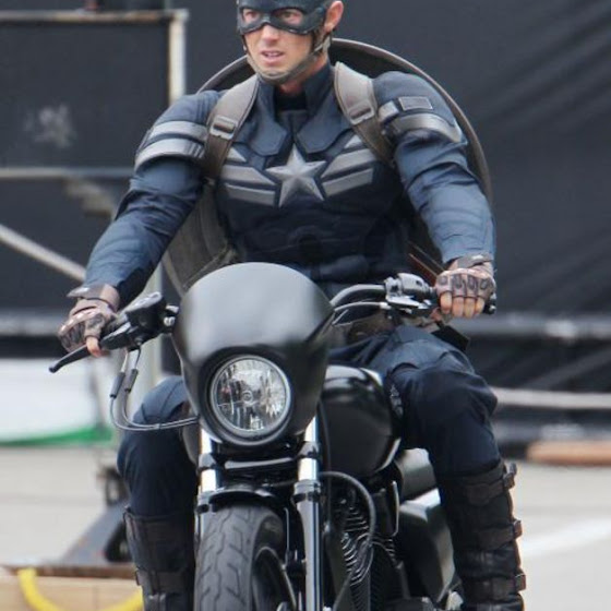 Captain America riding a bike in his new costume in Captain America 2