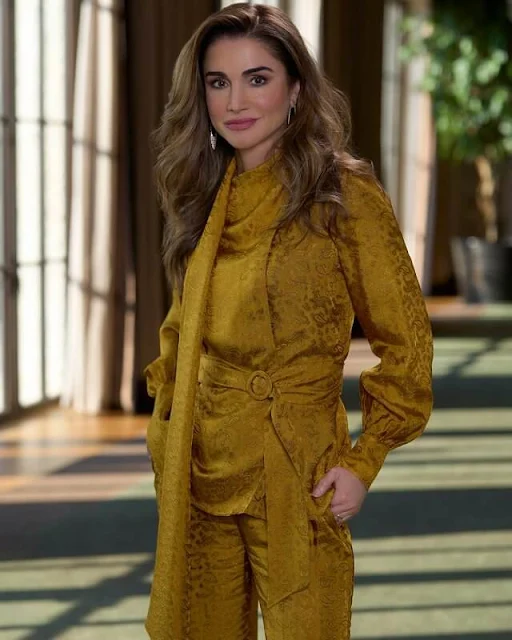 Queen Rania wore mustard yellow wilia belted satin jacquard blouse and hortencia satin jacquard pants by Erdem