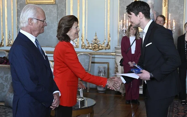 Queen Silvia wore a red double breasted blazer. The Queen wore a tartan blazer. Nils van der Poel and Pernilla Wiberg Bjerke