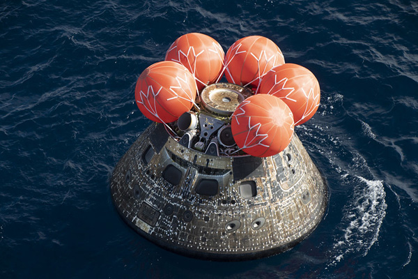 An aerial snapshot, taken by a U.S. Navy helicopter, of NASA's Orion spacecraft floating in the water...on December 11, 2022.