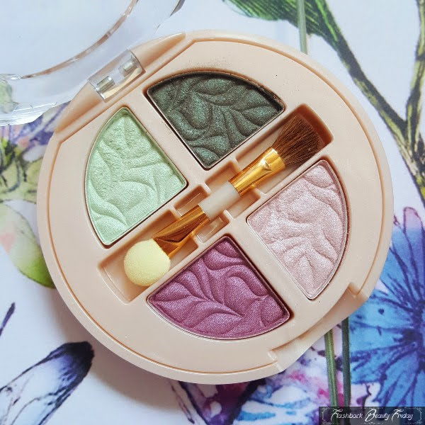 No7 Petal Eye Palette open compact with four shadow colours and small brush sponge applicator in centre