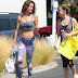 Hot and sweaty Brooke Burke, 42, cools down after spin class while proudly parading her rock hard abs.