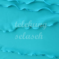 Telekung lycra biru turquoise corak curly di tepi