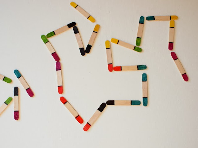 Make your own set of popsicle stick dominos