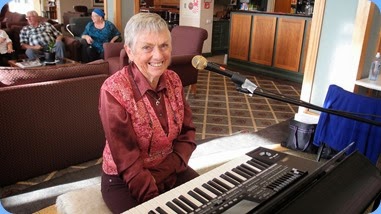 Jeanette about to play her Korg Pa3X. Photo courtesy of Dennis Lyons.