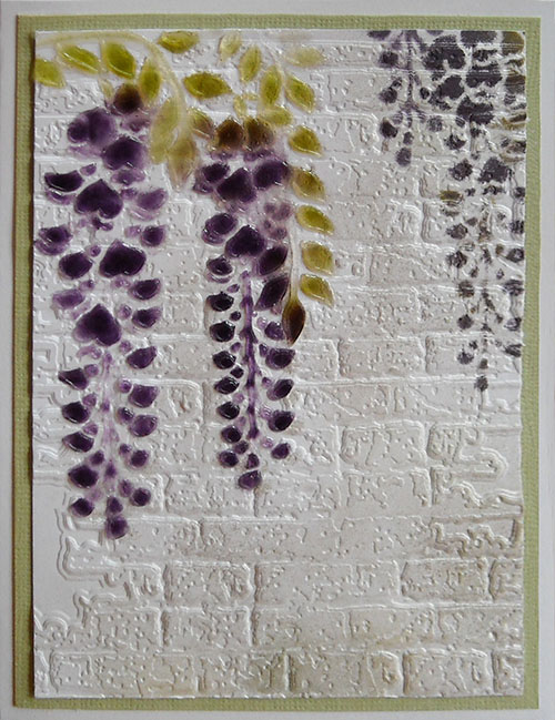  the wisteria stencil LG725 on top of the embossed brick wall