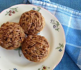 Food Lust People Love: These cinnamon gingernut muffins are baked with gingernut biscuits inside and as topping for the tender sweet and spicy muffin below. Add cinnamon glaze for an extra kick!