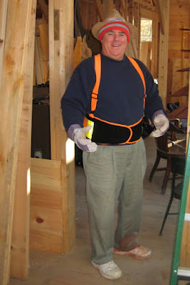 Pop all ready to work on some siding. Note the mark of the house on the left shoe.