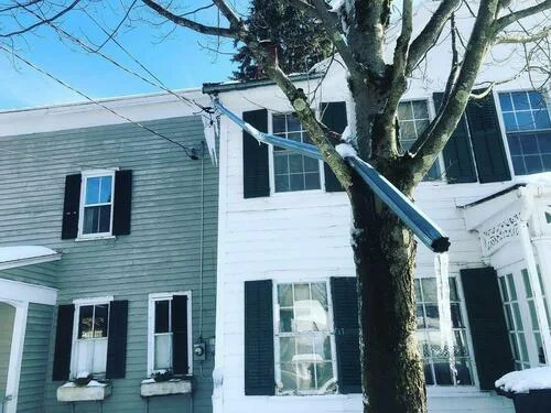 A home in New York with a misaligned gutter.