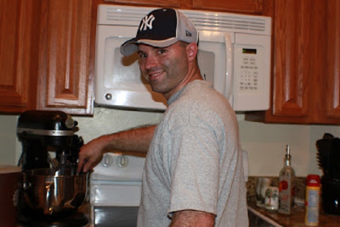 this is my son chad making his first banana bread creation with coconut, cherries and blueberries