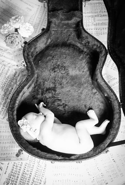 baby in guitar case newborn guitar photo