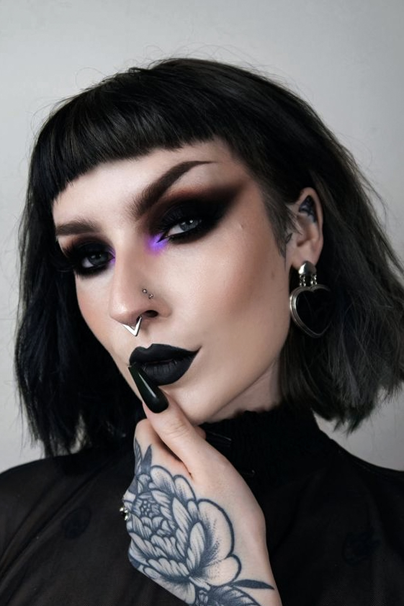 goth model with bob hair and Black Smokey Eye with Purple Accent makeup look