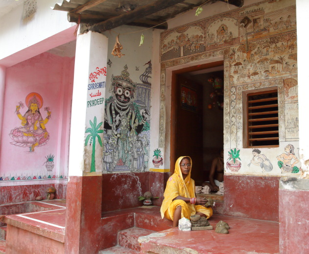 Intricate paintings on every home wall at Raghurajpur village, Odisha