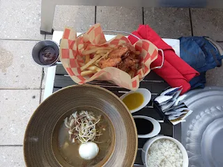 A complete saoto, Fried chicken wings and fries from Courtyard Marriott Paramaribo"