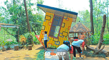 rumah terbalik coban talun batu