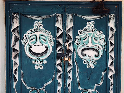 Mask design on the doors of Amargosa Opera House Theater.