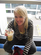 Chelsea at the London Airport drinking a smoothie. (cimg )