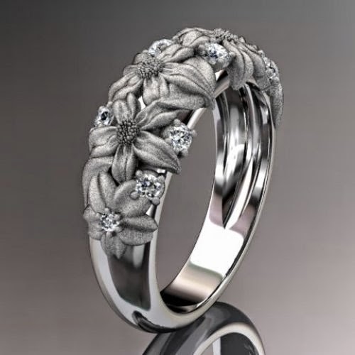 Beautiful Sterling Diamond Ring With Flower Work on It...