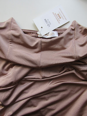 https://femmeluxefinery.co.uk/products/nude-corset-strapless-bodycon-mini-dress-emery