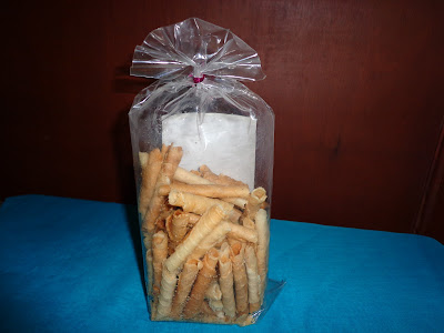 Opak Gambir Seruling Mini Merk Adisa Harga Rp. 9.000/ pcs atau Rp. 40.000/Kg, tampak belakang