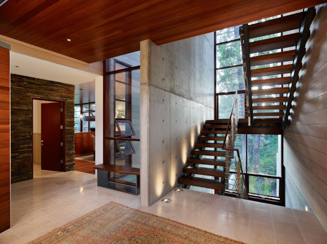 Concrete walls and wooden staircase 