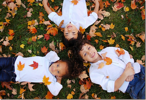 Kids-in-leaves