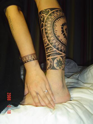 arm and leg tattoo, matching designs