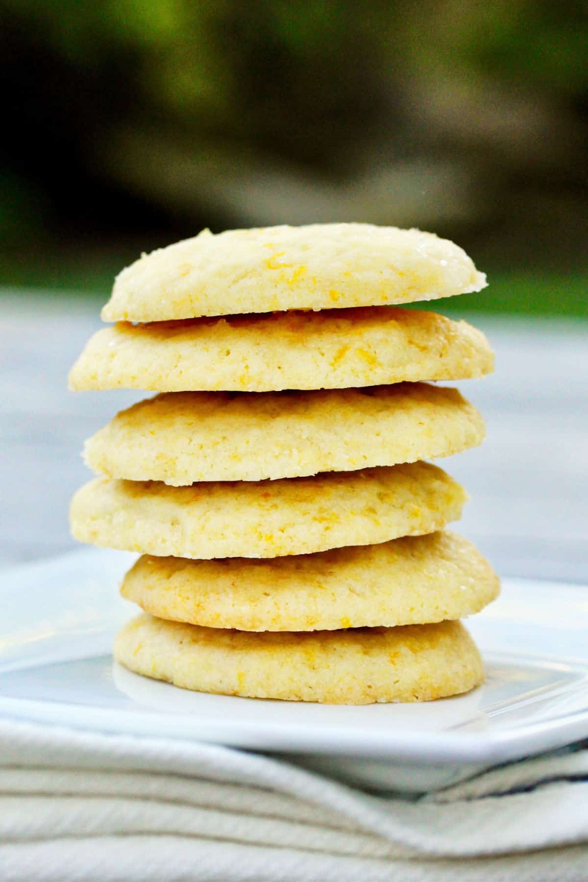 Meyer Lemon Vanilla Shortbread Cookies stacked.