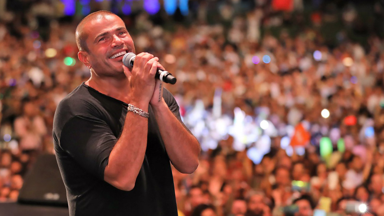Amr Diab Dazzles in Dubai Concert: Youthful Style and New Song Debut Triumphant Return to the Stage    Egyptian superstar Amr Diab made a triumphant return to performing after a 50-day hiatus, captivating fans with a major concert at Dubai's Arena on Saturday night.