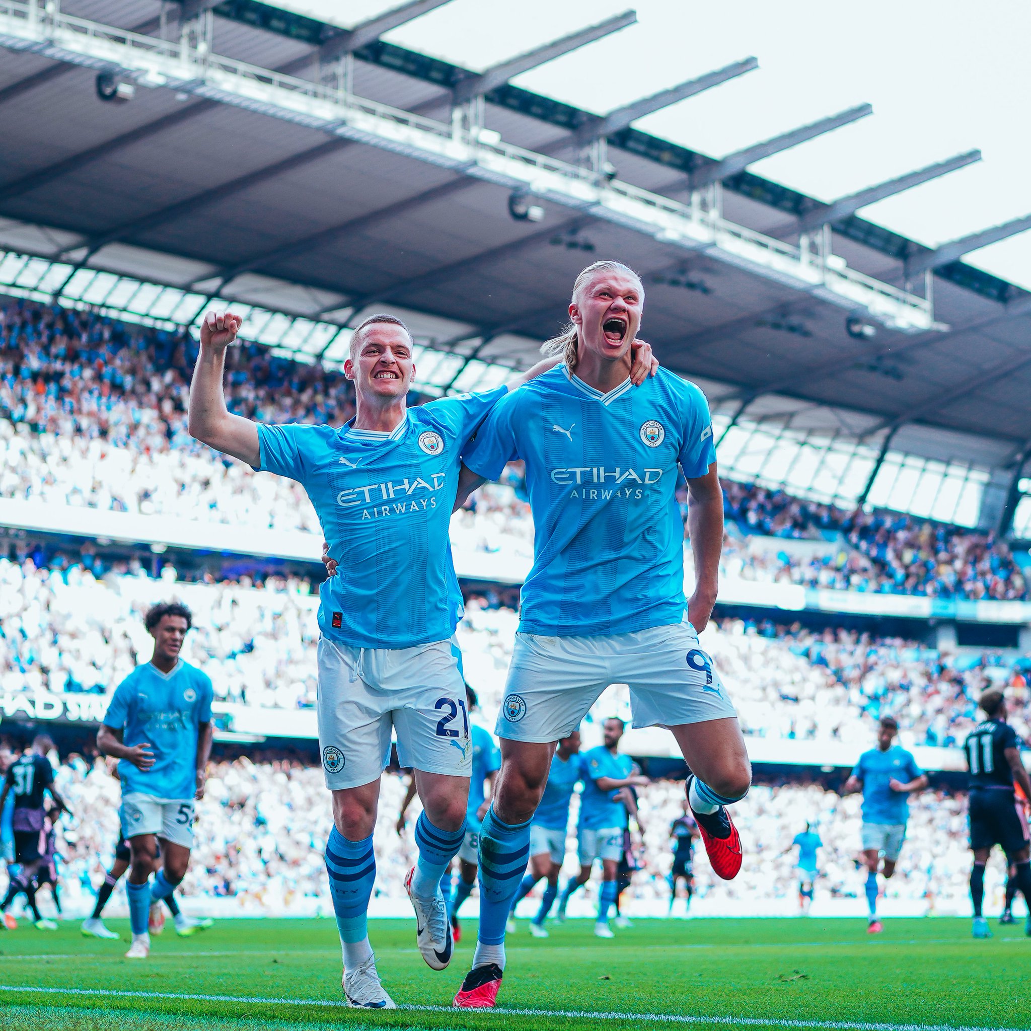 Norwegian sharpshooter, Erling Braut Haaland, celebrates goal for Manchester City with teammates, Phil Foden, in the Premier League match against Fulham at Etihad Stadium on Saturday 2 September, 2023