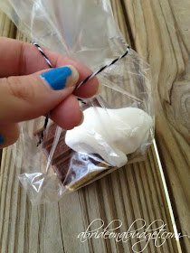 Looking for a fun Halloween treat -- that you can make last minute? Make these spooky s'mores favors at www.abrideonabudget.com.