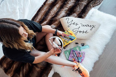 Ashley Benson summer essentials: Prive Revaux sunglasses, beach bag, headphones & SweeTarts