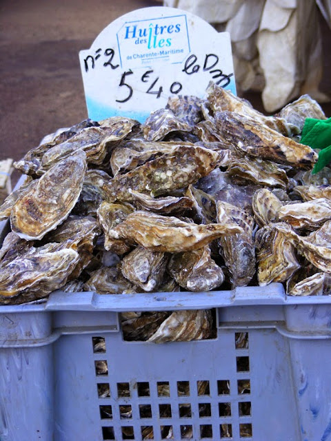 Oysters at a market, France. Photo by Loire Valley Time Travel.