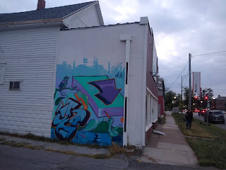 alley side of 237 Collective with mural painted on part of the wall