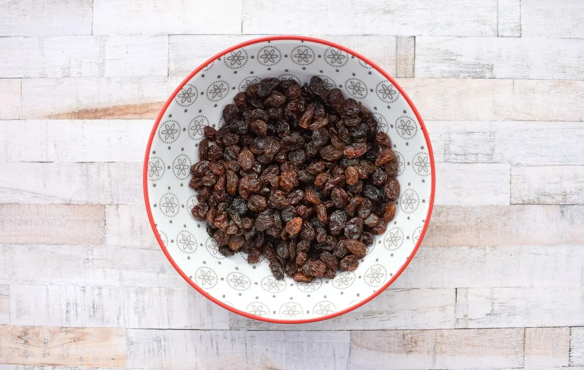 A bowl of raisins.