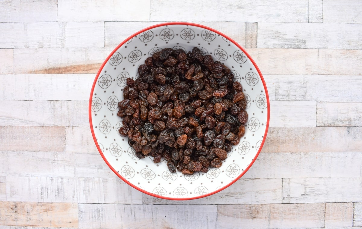A bowl of raisins.
